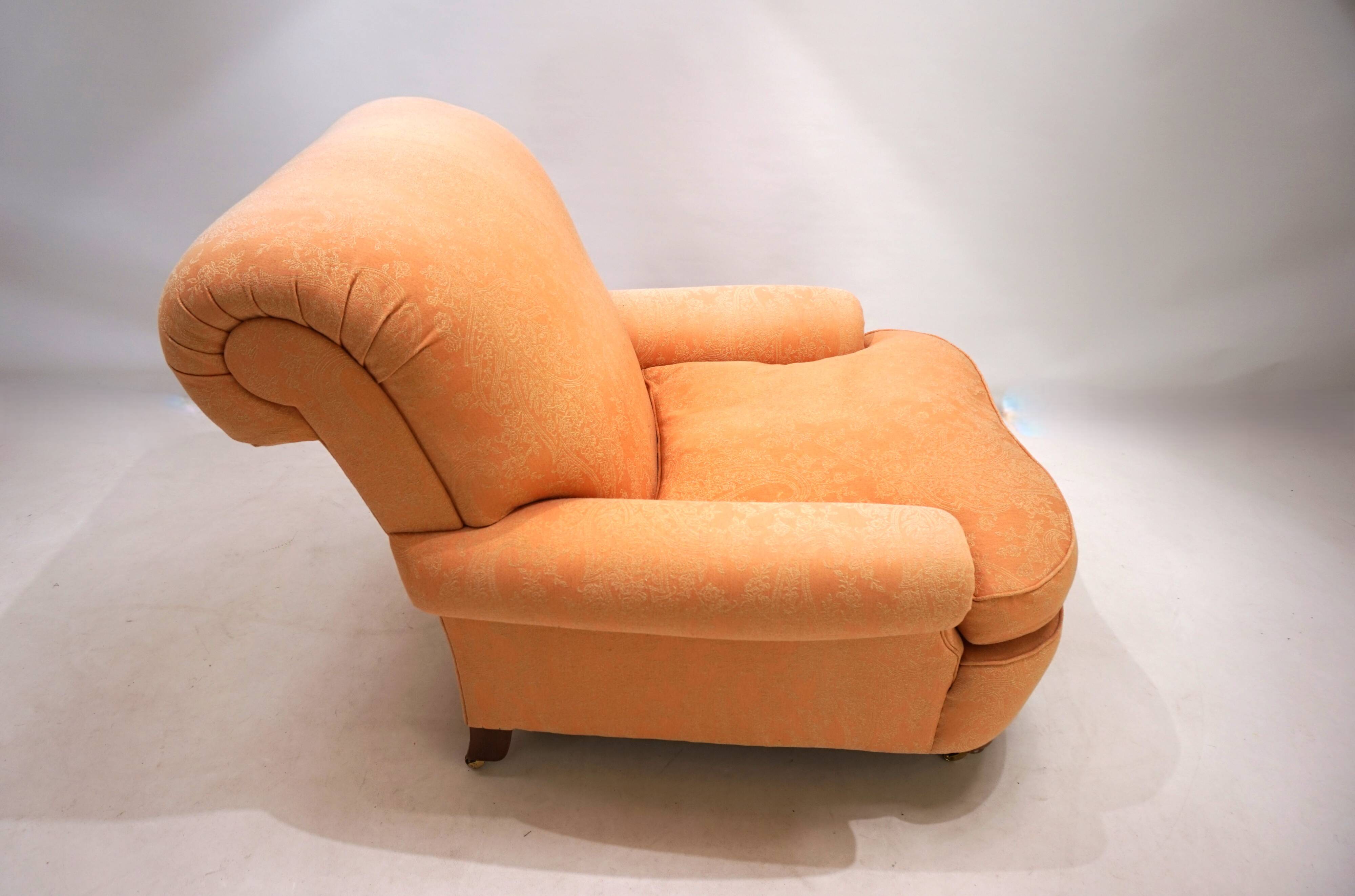 Deep seated armchair in the style of Howard & Sons