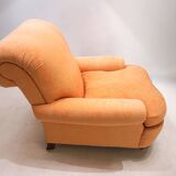 Deep seated armchair in the style of Howard & Sons