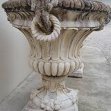 Pair of planter vases decorated with faces in reconstituted stone 1950s