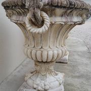 Pair of planter vases decorated with faces in reconstituted stone 1950s