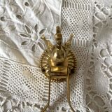 Swan toilet paper dispenser in brass