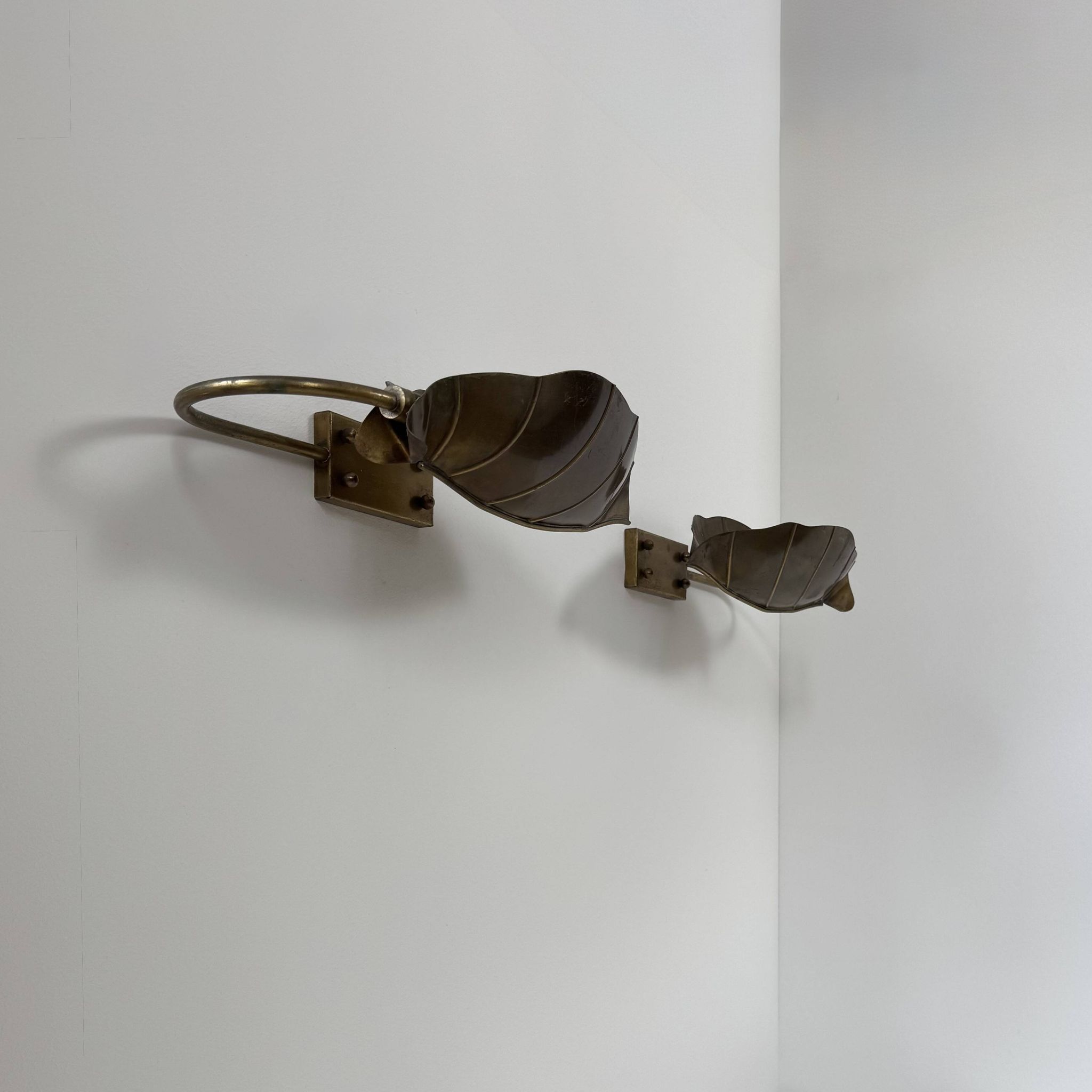 Pair of vintage wall lights, patinated brass, France, 1970.