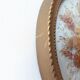 Golden vintage frame with bouquet of dried flowers under globe, wedding bouquet, antique bouquet
