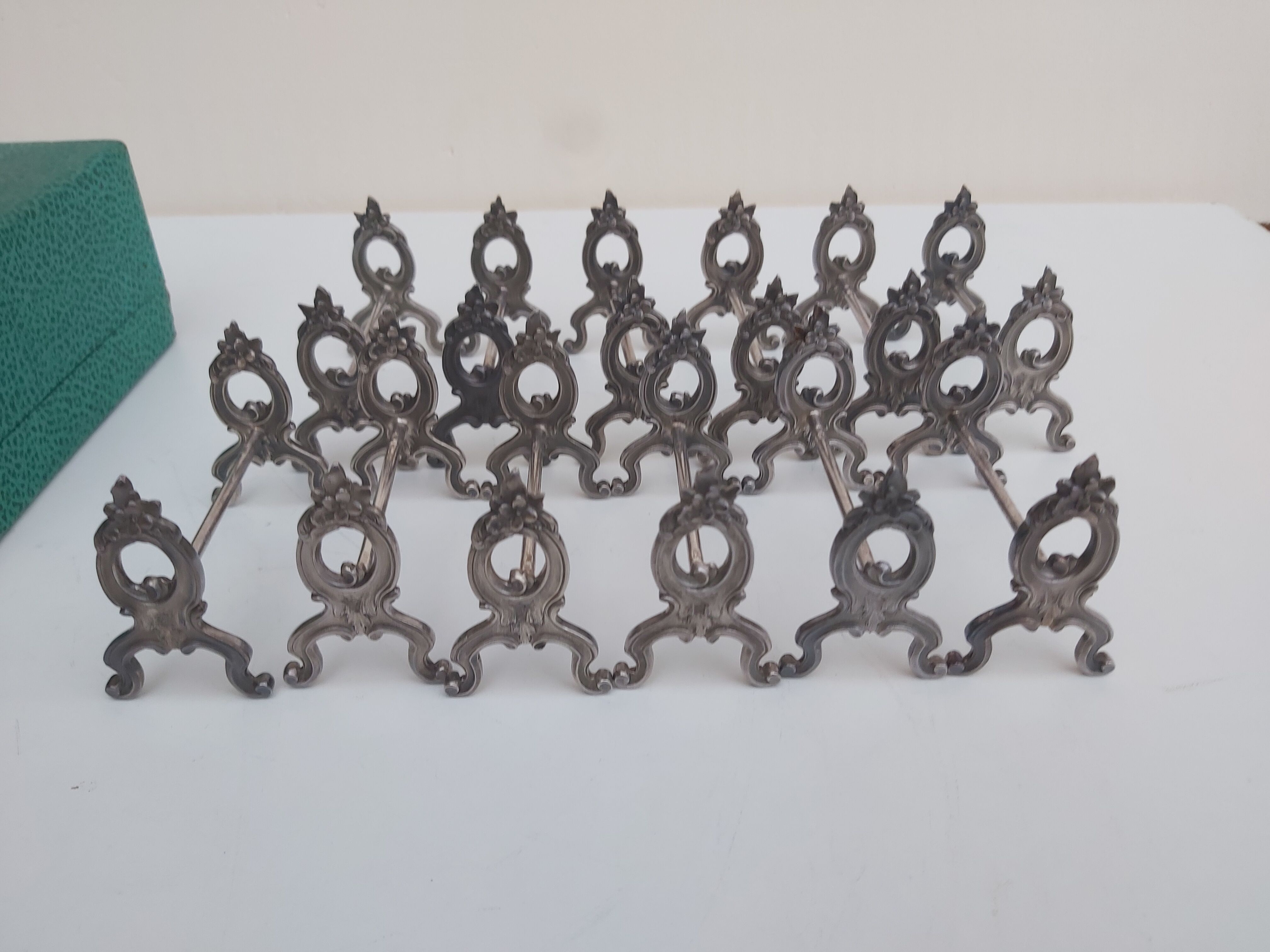 12 knife holders in their SFAM silver metal box