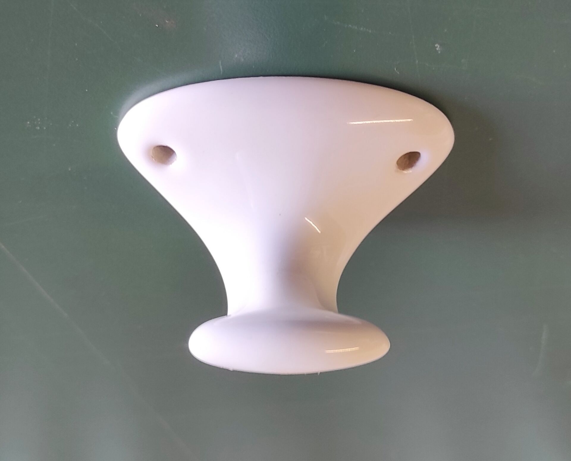 Wall-mounted coat hook in porcelain - mid 20th century