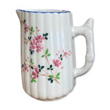 Small pitcher in iron earth with double old decoration