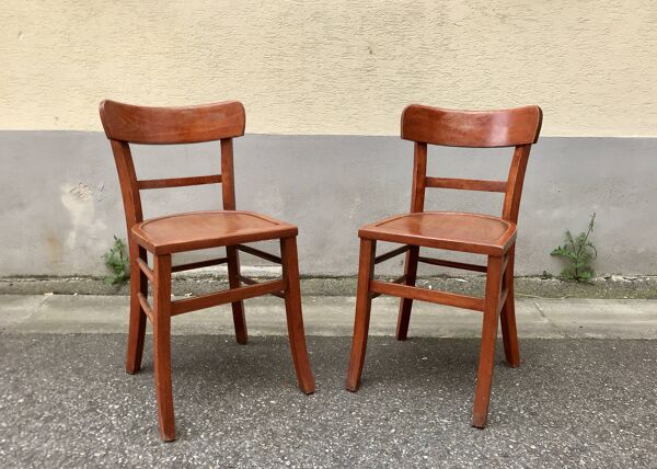 Paire de chaises bistrot en bois avec patine orangée 1950
