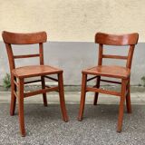 Pair of wooden bistro chairs with orange patina, 1950s