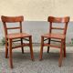 Pair of wooden bistro chairs with orange patina, 1950s