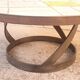 Round ceramic and steel coffee table