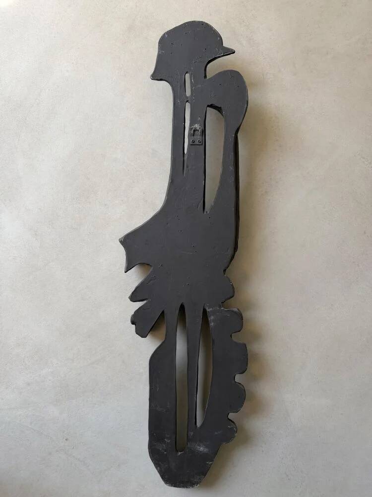 Brutalist wall sculpture with birds Ars Munda