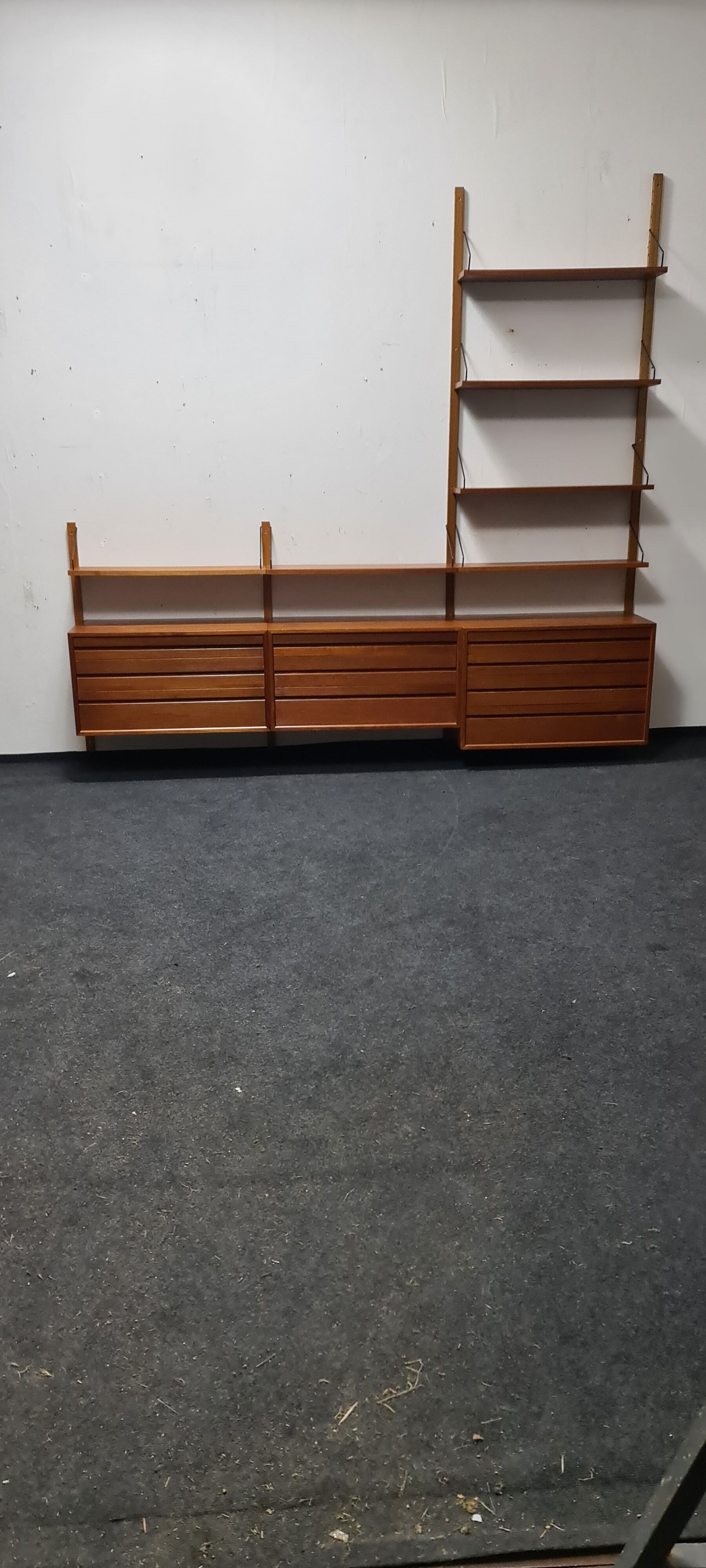 Teak wall unit by Poul Cadovious