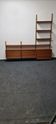 Teak wall unit by Poul Cadovious