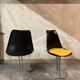 Set of black and yellow tulip chairs