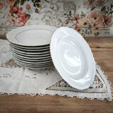 12 deep plates in porcelain with double gold trim.