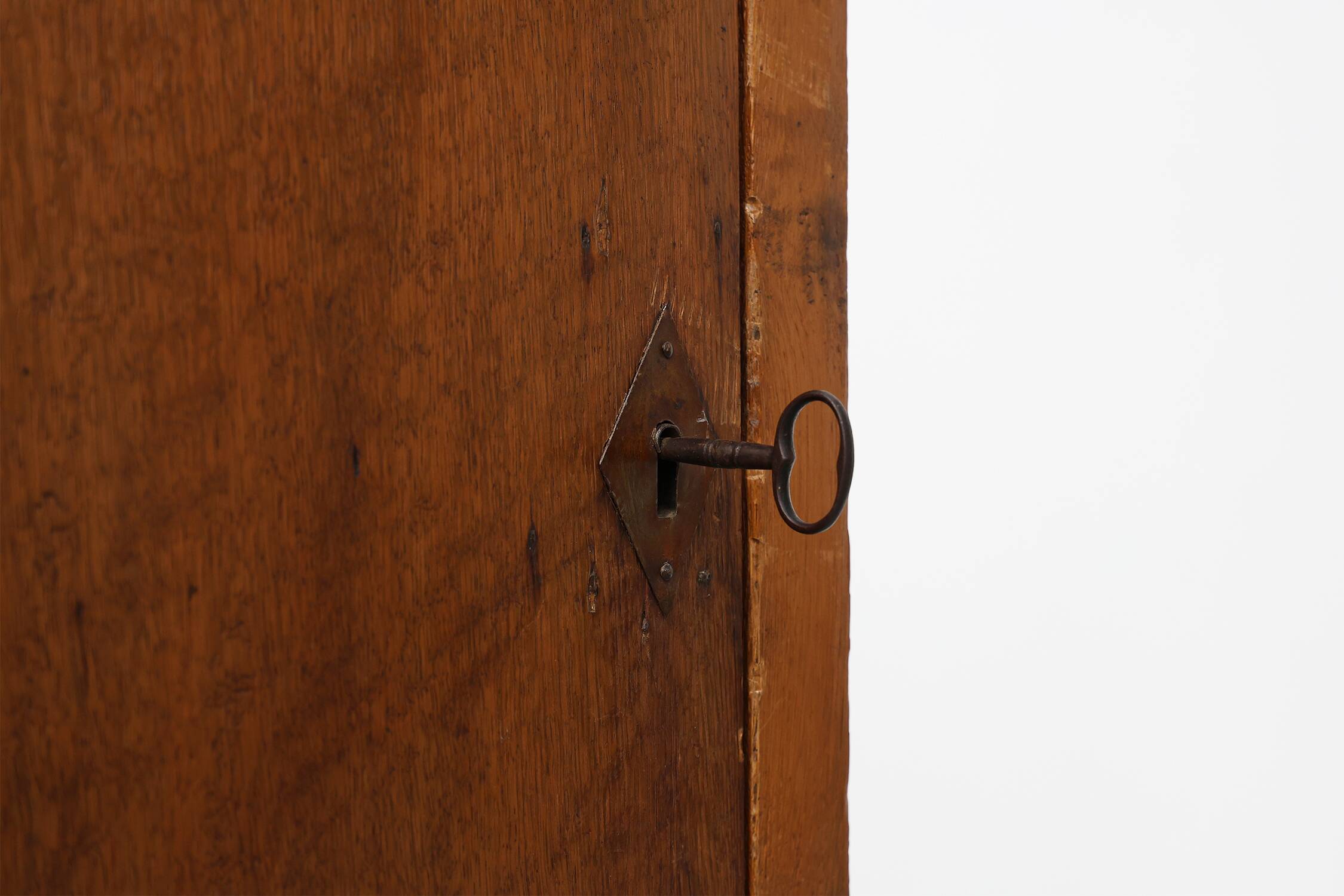 Tall rustic French monastery wardrobe in oak from the late 19th century