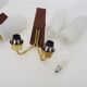 Pair of Scandinavian wall sconces in teak, brass and opaline glass globe
