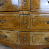 Louis XV period curved chest of drawers in elm and marquetry fillets circa 1750