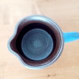 Old glazed blue sandstone pitcher