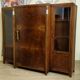 Important Art Deco library in amboyna and mahogany veneer.