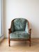 Antique bergère armchair in wood and green velvet