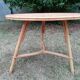 Vintage round rattan tripod coffee table