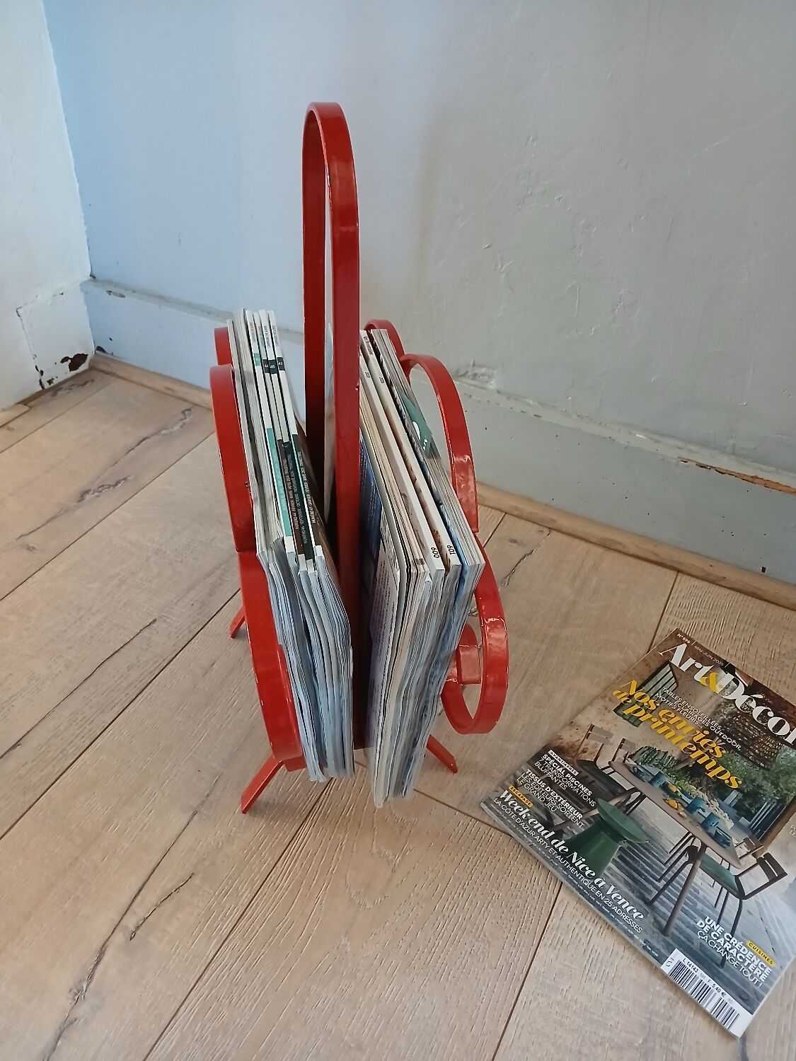 Vintage wrought iron magazine rack