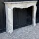 Cheminee de style Louis XV en marbre blanc de Carrare arabescato