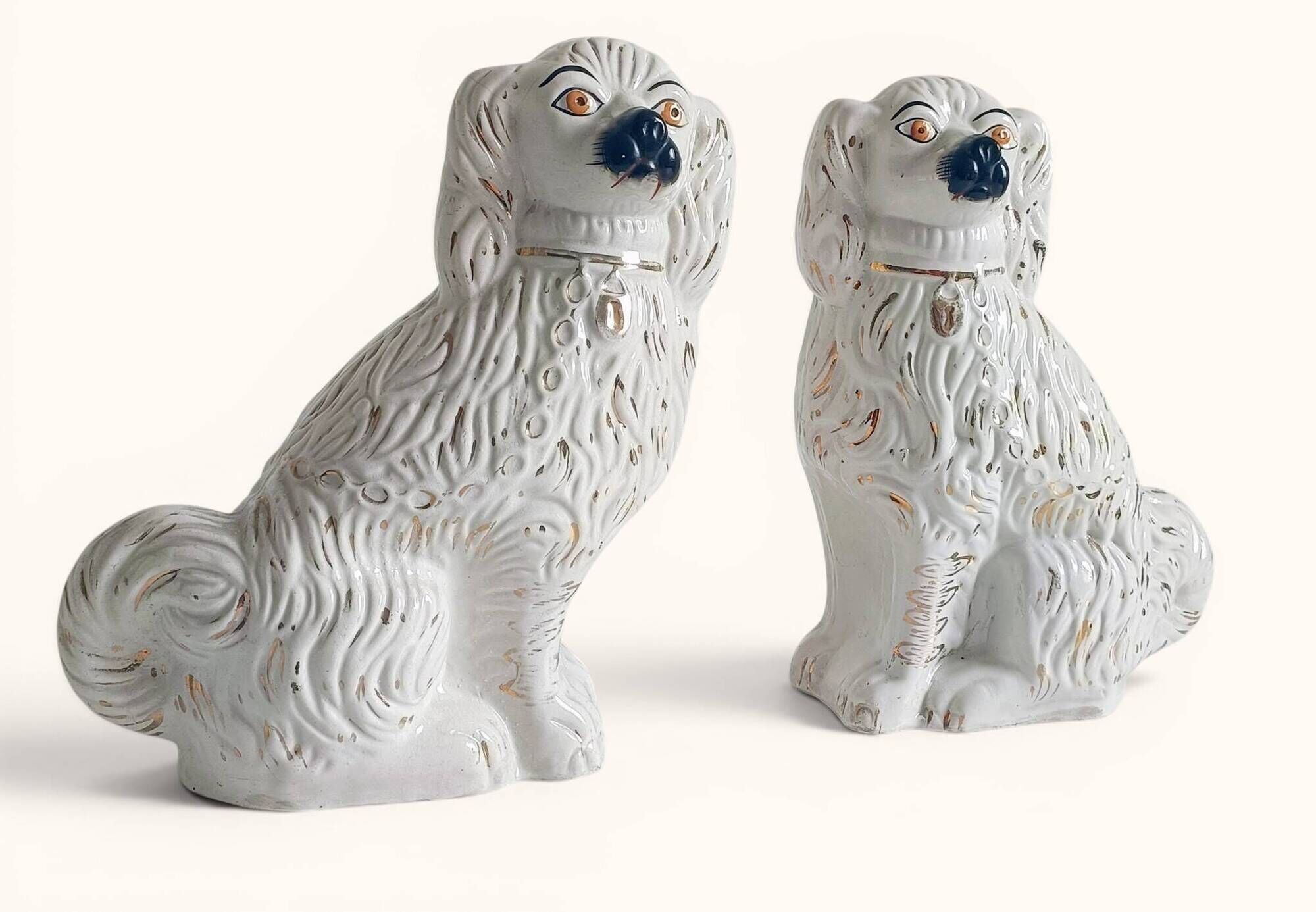Pair of King Charles Spaniel dogs in Staffordshire majolica style.