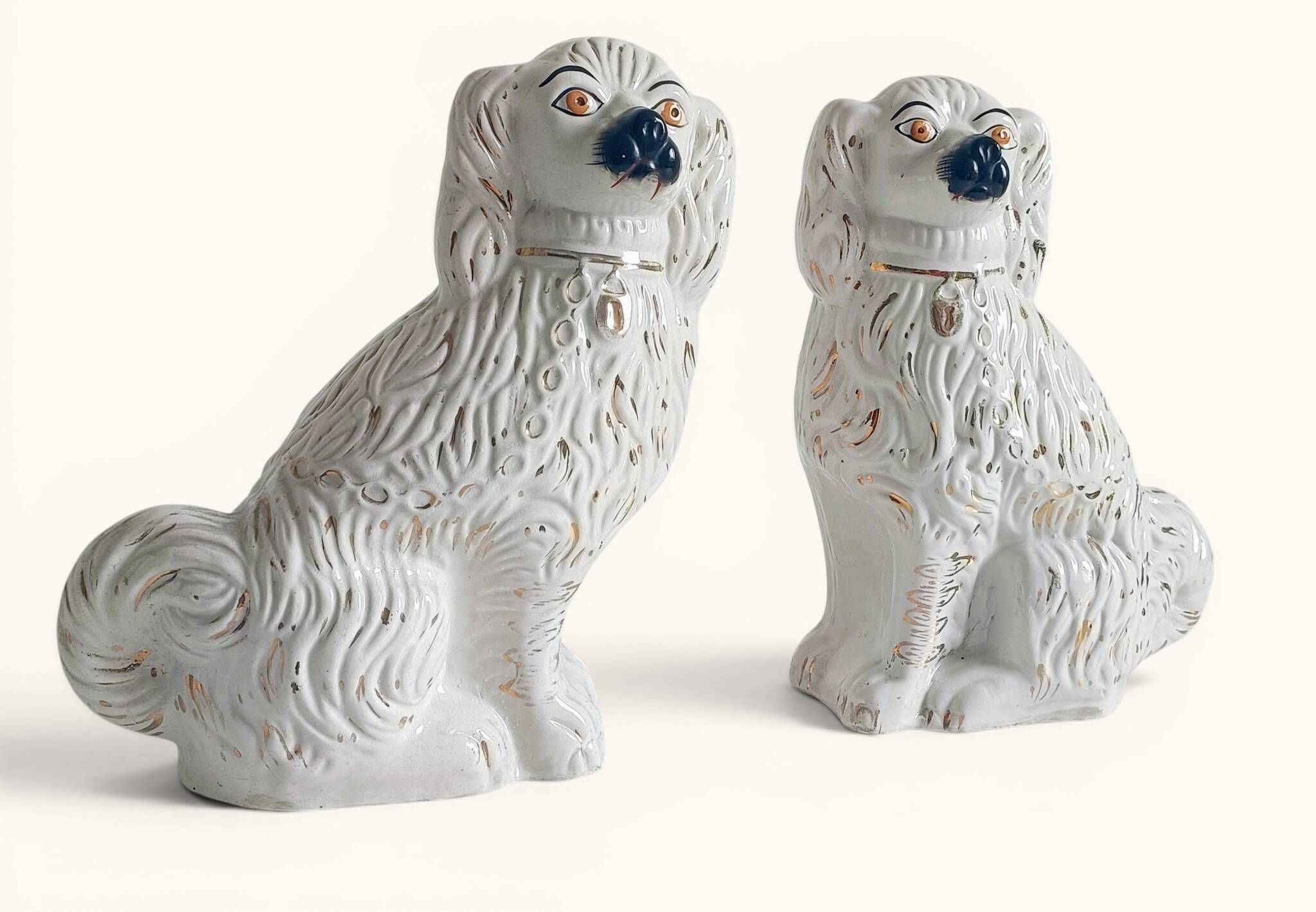 Pair of King Charles Spaniel dogs in Staffordshire majolica style.