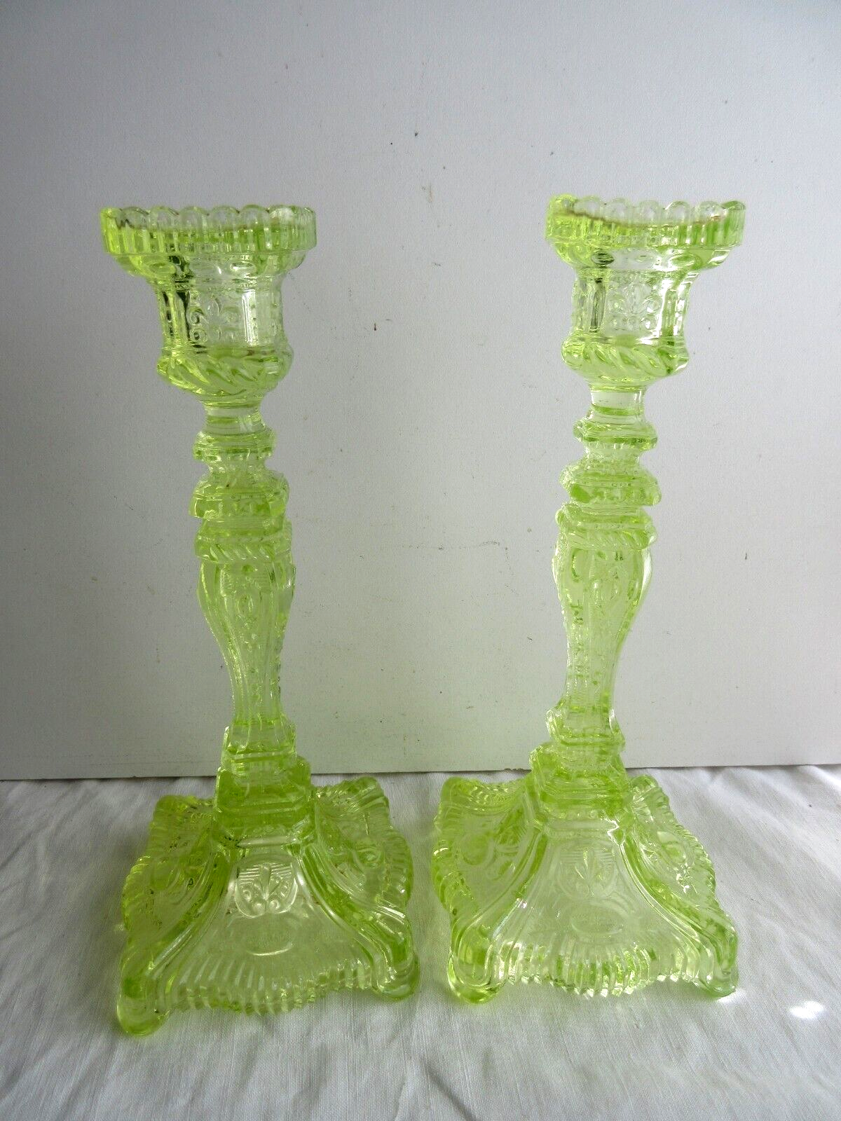 2 old yellow uraline glass candle holders signed portieux