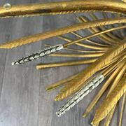 Gold metal and glass coffee table, 20th century, in the style of Robert Goos.