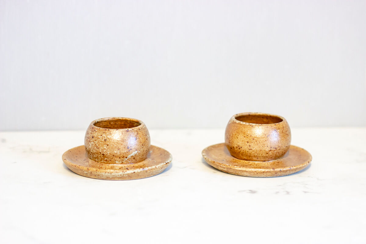 2 stoneware shells, unidentified signature