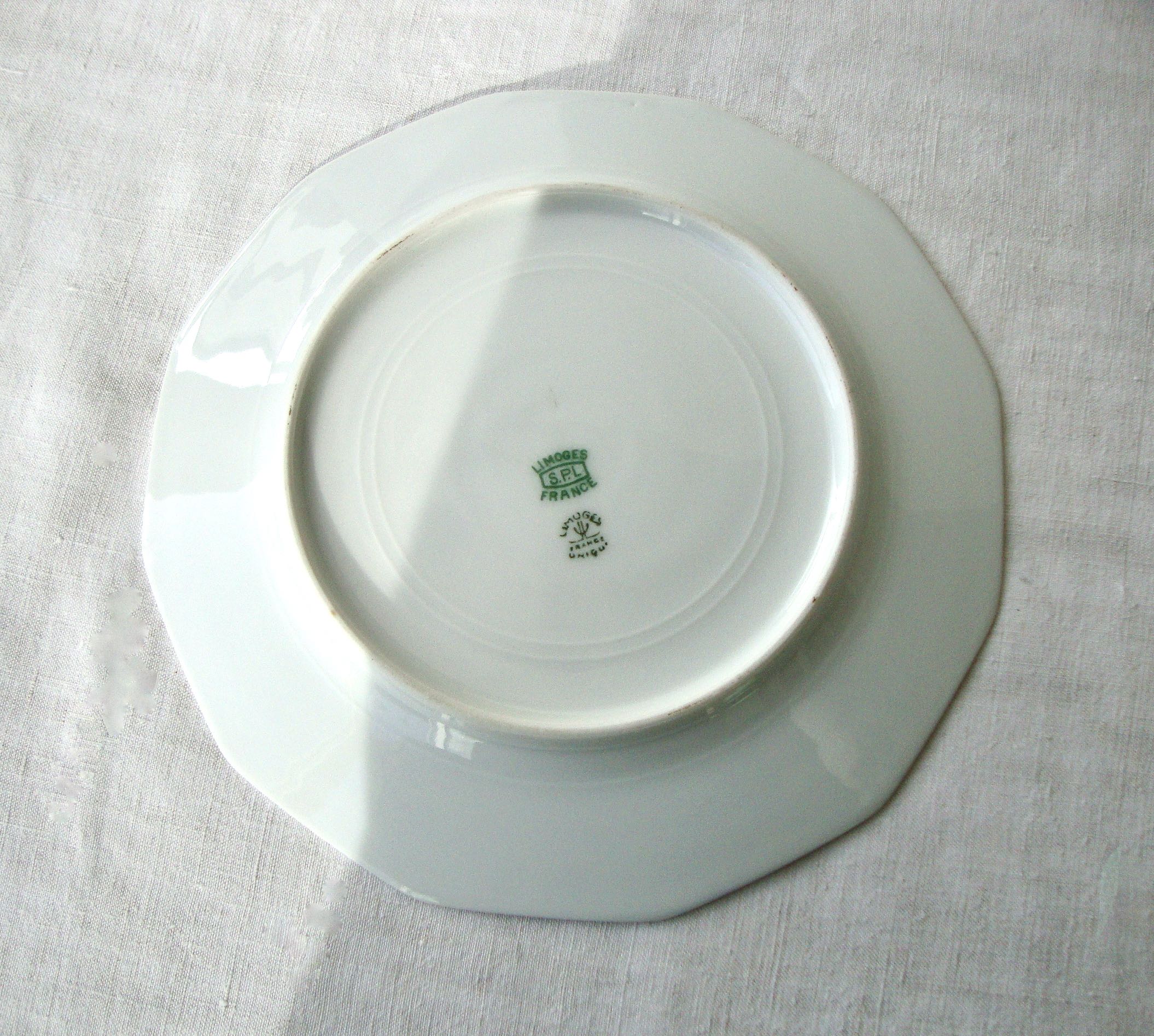 Set of 9 Limoges porcelain dessert plates