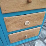 Asymmetrical changing table cabinet