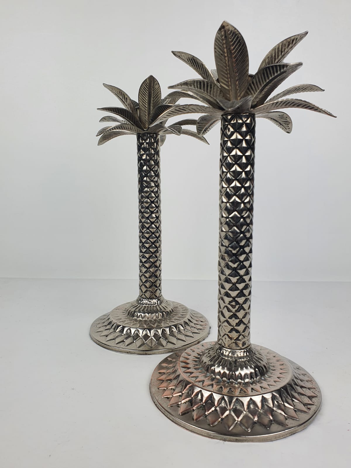 Pair of Palmtree design candle holders