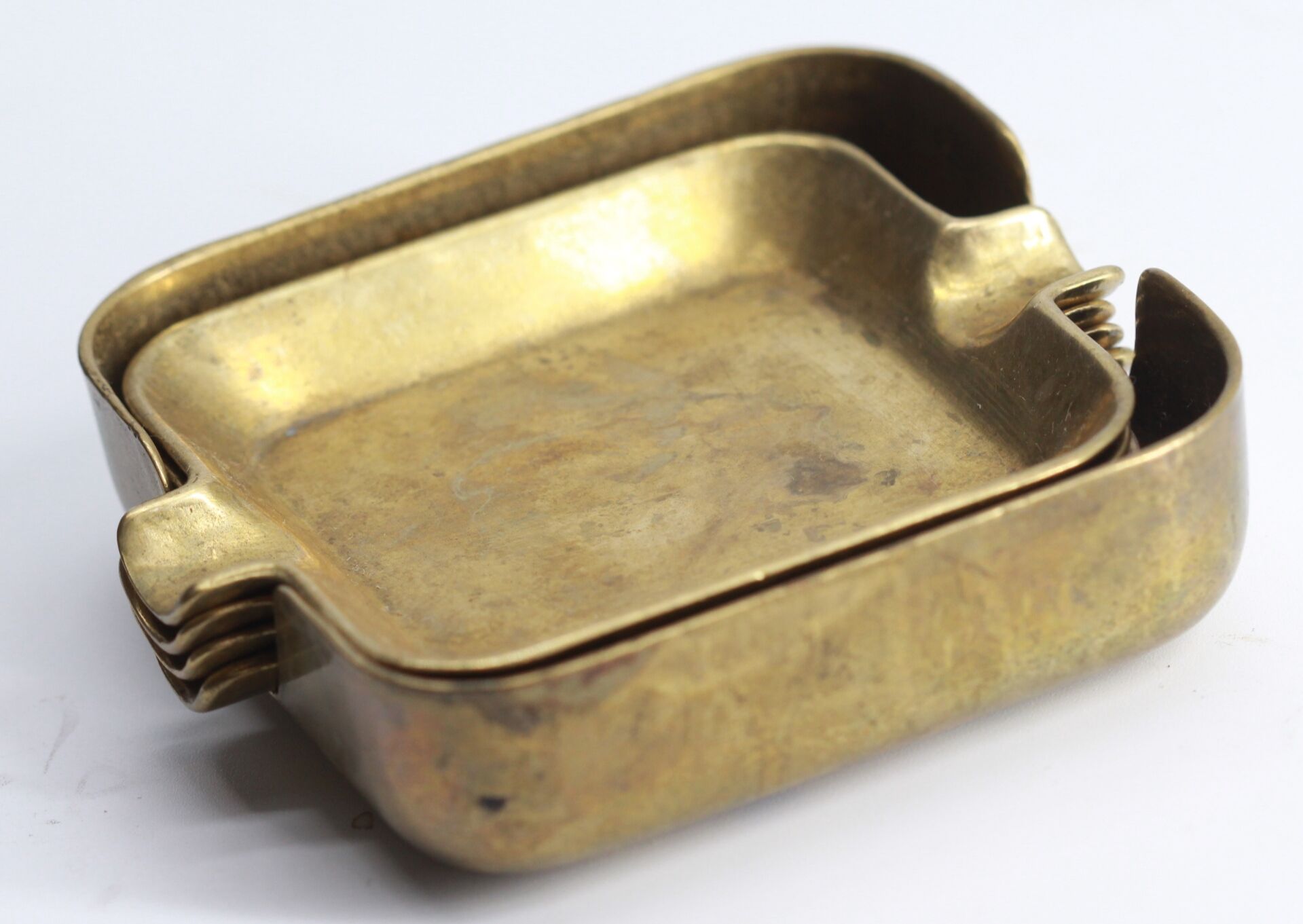 Set of 5 brass ashtrays