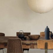 Chair design in rattan, woven wicker and chrome wire metal.