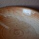 Set of 10 turned stoneware plates, pyritised and glazed, wabi-sabi brutalist.