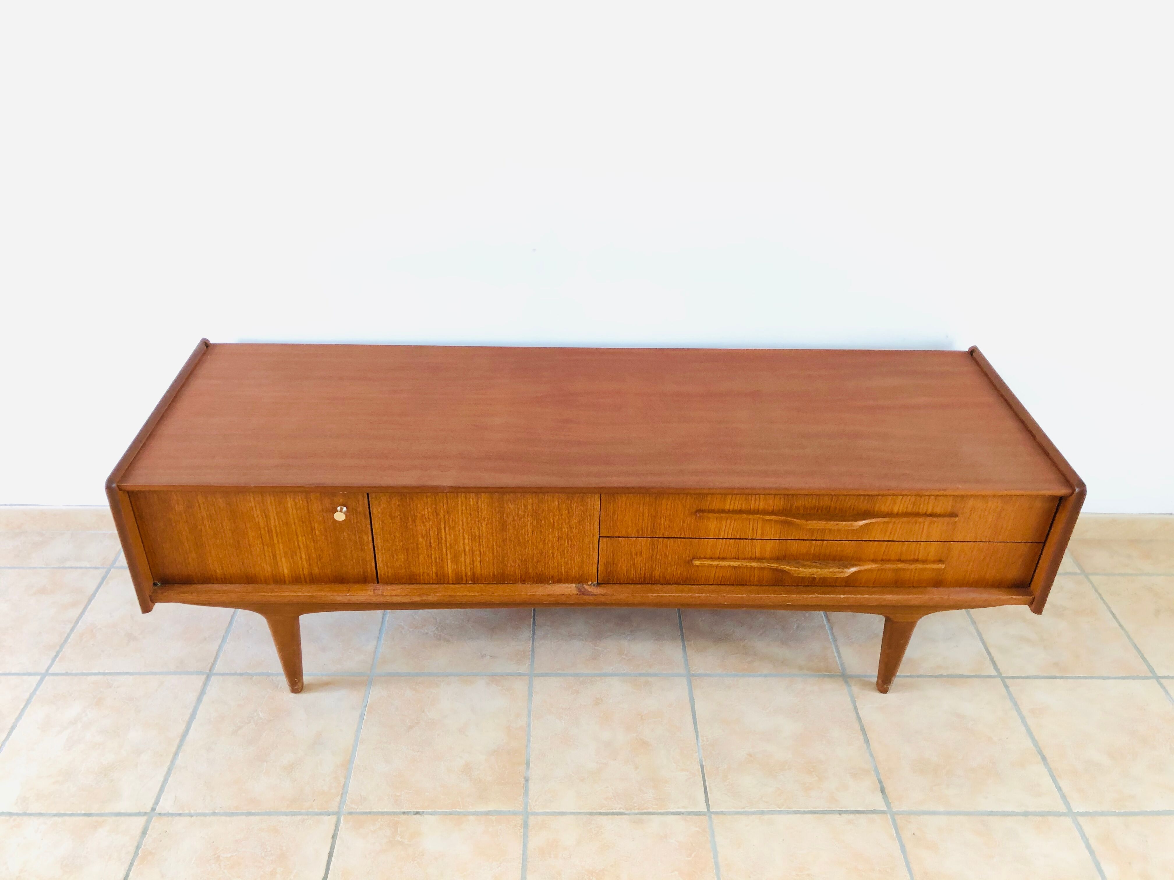 Scandinavian bass line in teak 1960