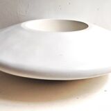 White resin planter in saucer shape - futuristic movement
