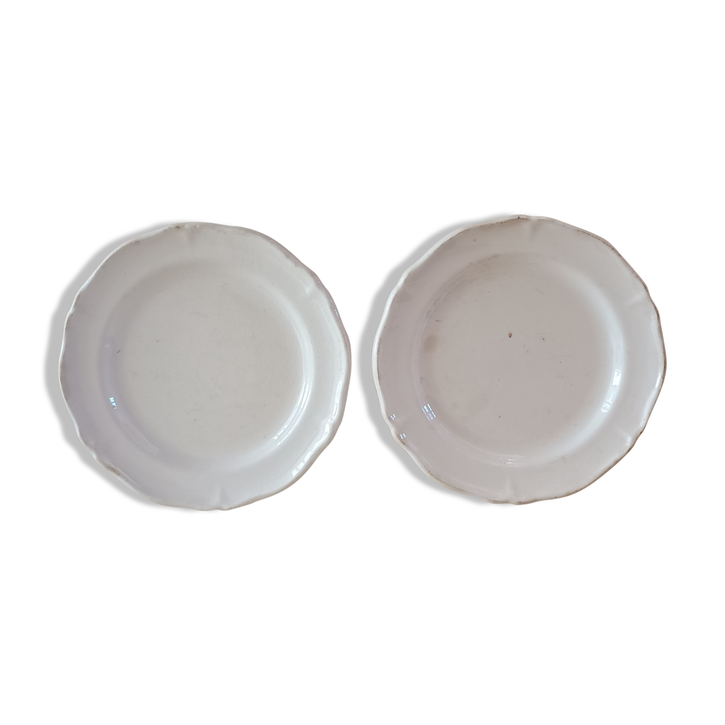 2 ivory plates with godrons