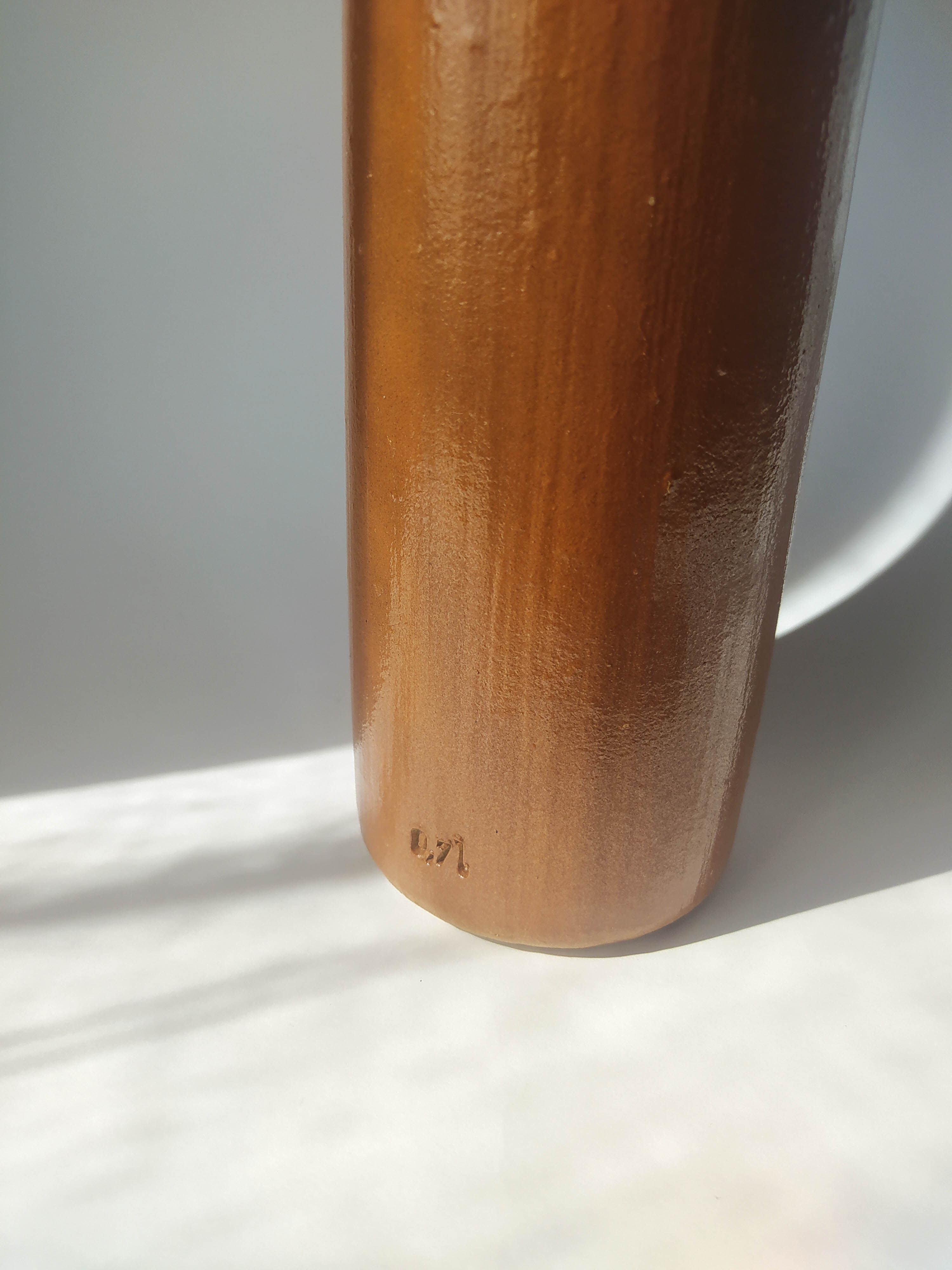 Vintage brown stoneware bottle