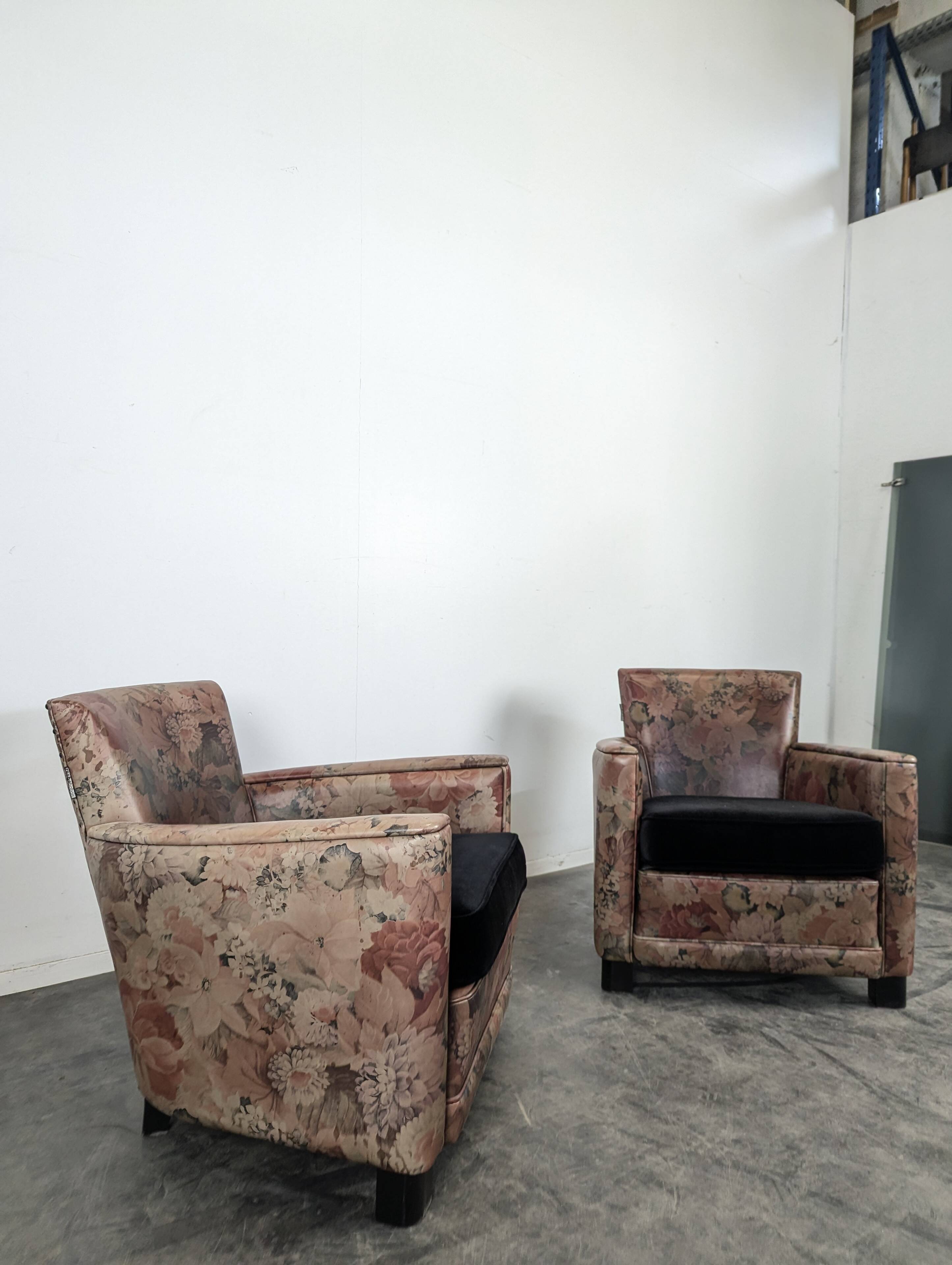 Pair of Roche Bobois armchairs with floral patterns.
