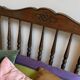 1 bed with a wooden frame and mattress