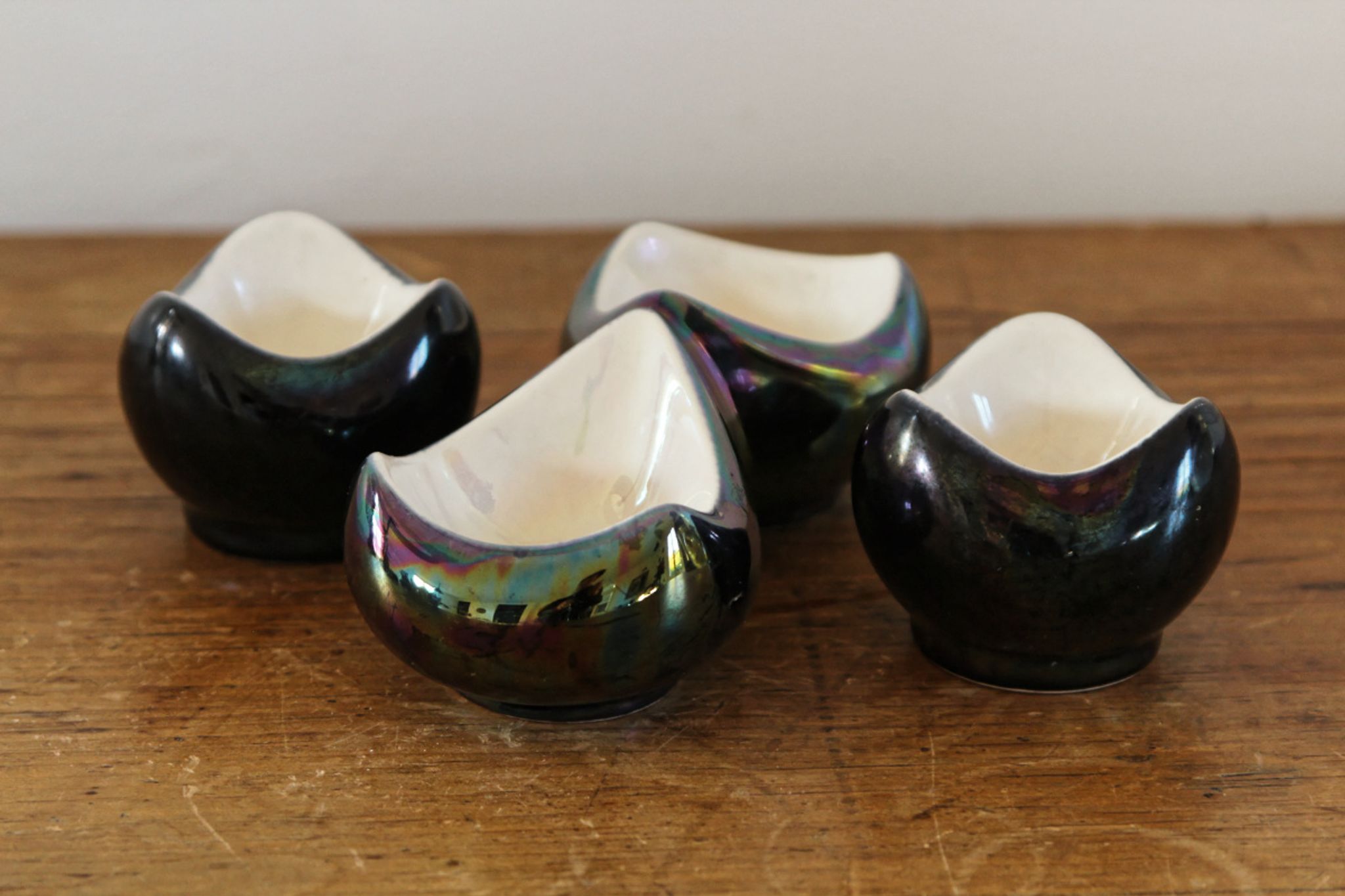 Lot of iridescent earthenware salerons