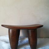 Tabouret where african head rests