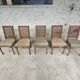 Set of 5 antique wooden and caned chairs.