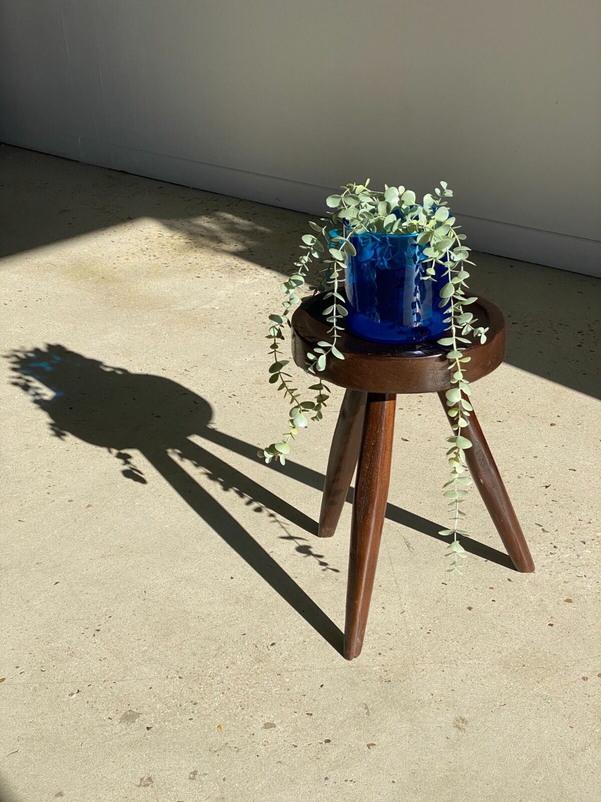 Brown solid wood stool seated circular dug