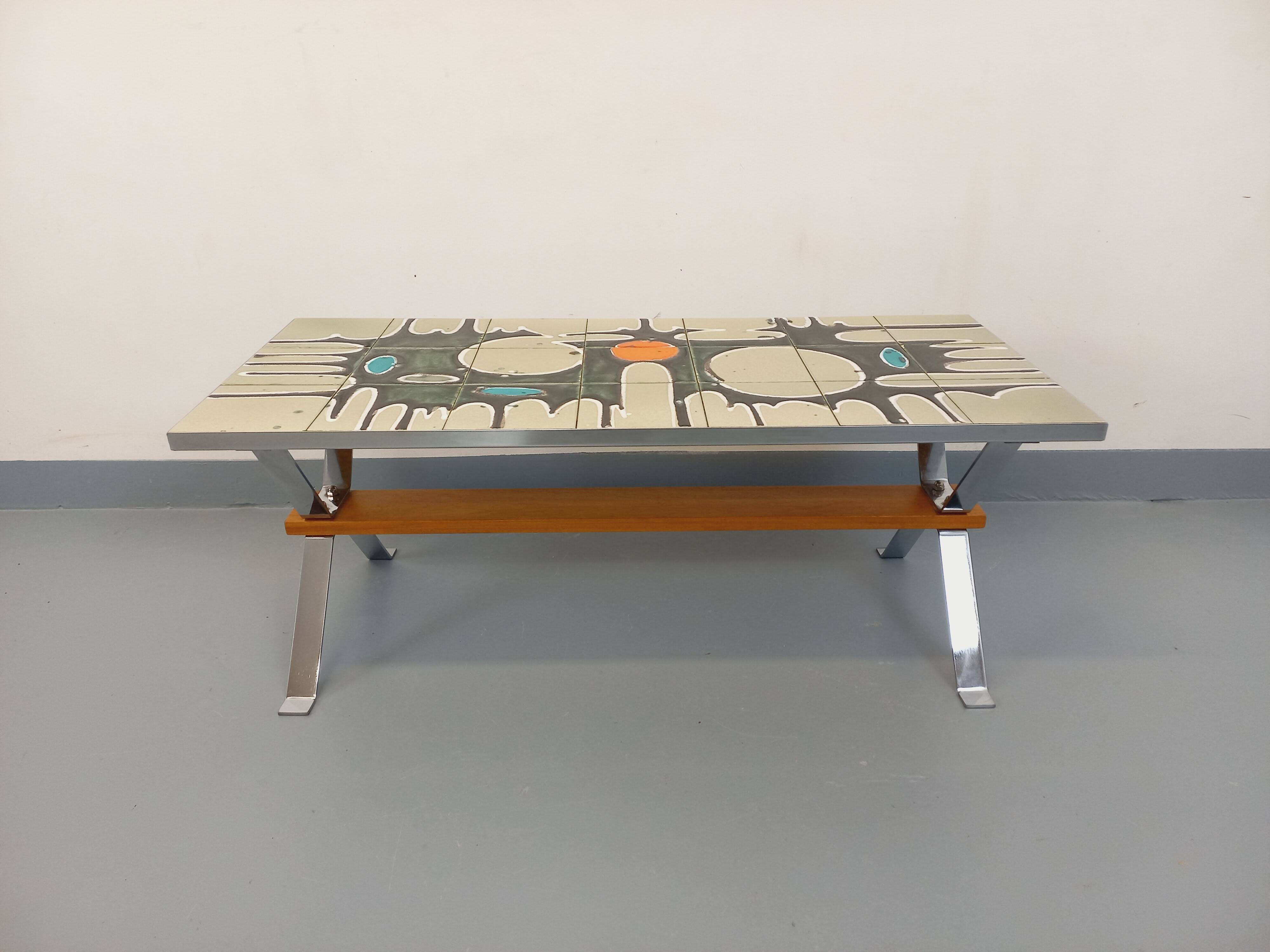 Vintage coffee table from the 60s and 70s in ceramic, chrome metal, and wood.